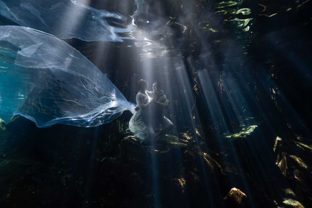 trash the dress couple cenote